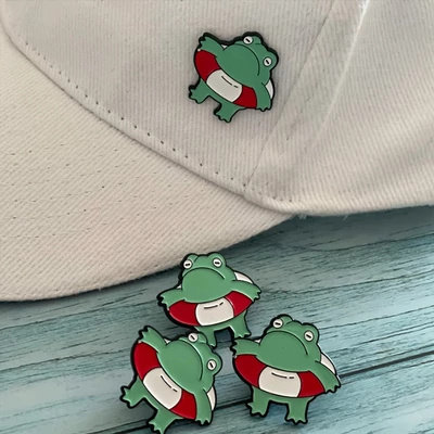 Breki úszógumival Kitűző