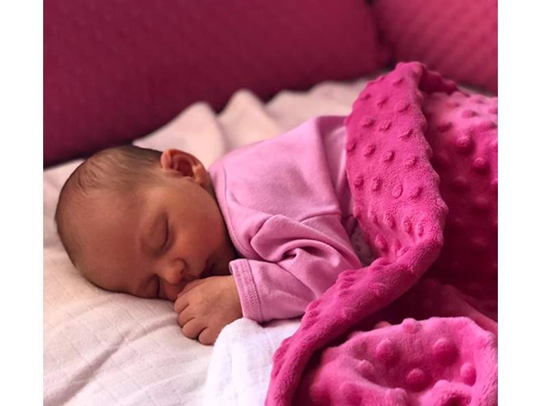 Hogyan öltöztessük a babát éjszaka?