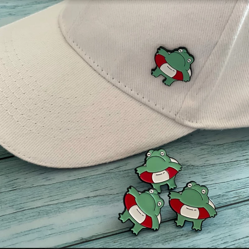 Breki úszógumival Kitűző